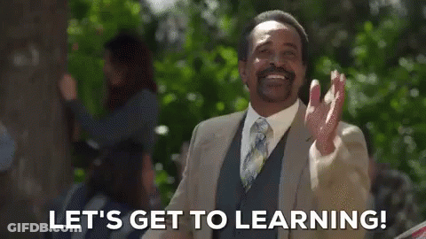 Man In Suit And Tie Saying Let's Get To Learning GIF