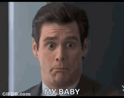 Man In Suit And Tie Saying My Baby GIF