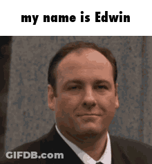 Man In Suit And Tie Saying My Name Is Edwin GIF