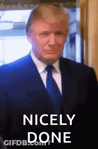 Man In Suit And Tie Saying Nicely Done GIF
