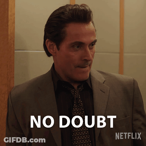 Man In Suit And Tie Saying No Doubt GIF
