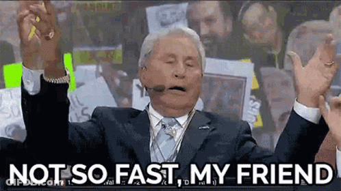 Man In Suit And Tie Saying Not So Fast GIF