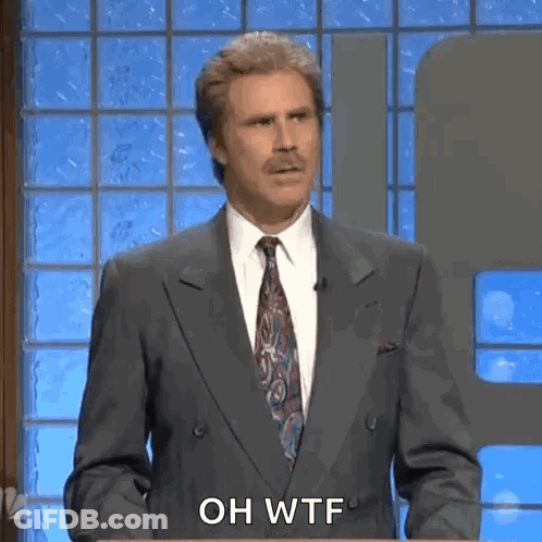 Man In Suit And Tie Saying Oh WTF GIF