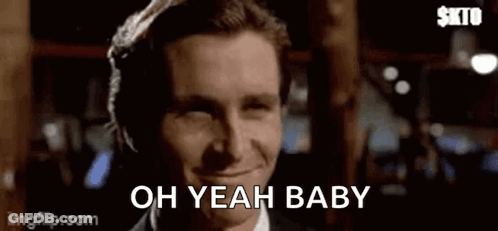 Man In Suit And Tie Saying Oh Yeah Baby GIF