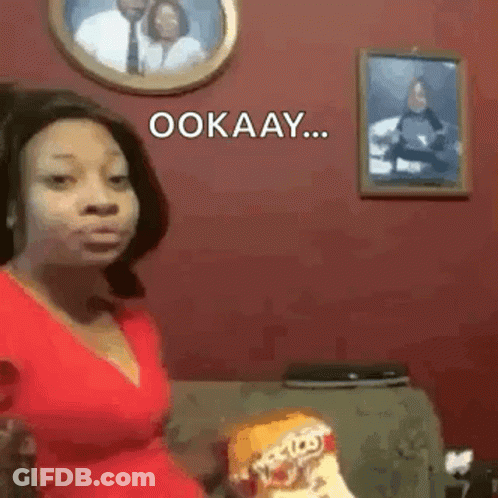 Man In Suit And Tie Saying Okay GIF