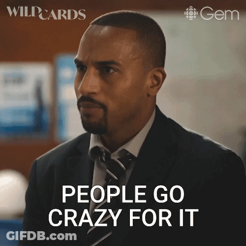Man In Suit And Tie Saying People Go Crazy For It GIF