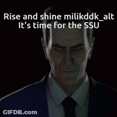 Man In Suit And Tie Saying Rise And Shine GIF