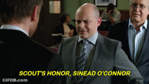 Man In Suit And Tie Saying Scout's Honor GIF