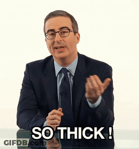 Man In Suit And Tie Saying So Thick GIF