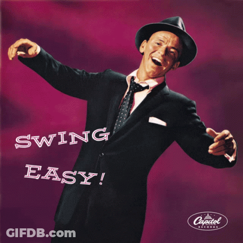 Man In Suit And Tie Saying Swing Easy GIF