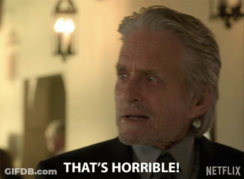 Man In Suit And Tie Saying That's Horrible On Netflix GIF