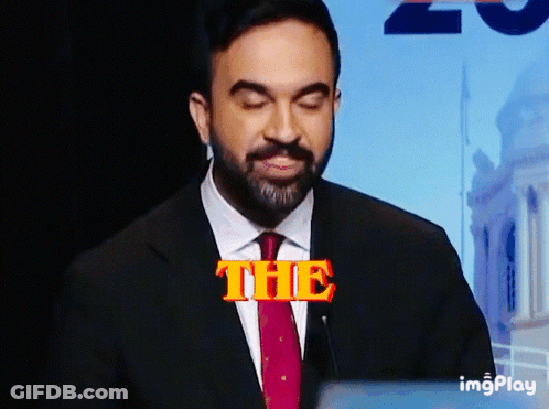 Man In Suit And Tie Saying The In Orange GIF