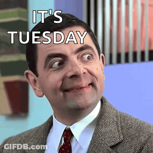 Man In Suit And Tie Saying Tuesday GIF