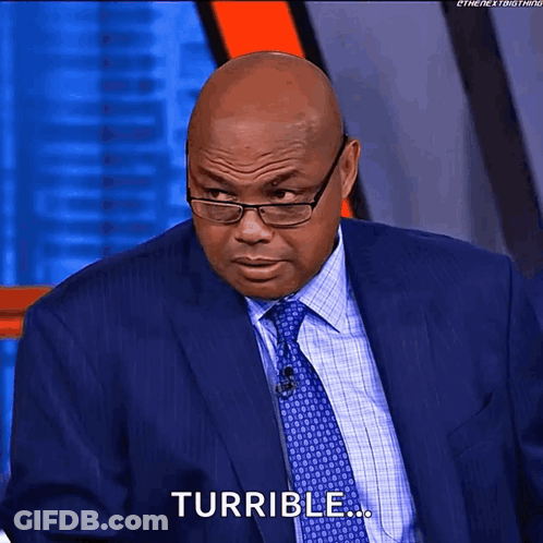 Man In Suit And Tie Saying Turrible GIF