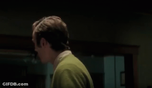 Man In Suit And Tie Saying We Are Back GIF