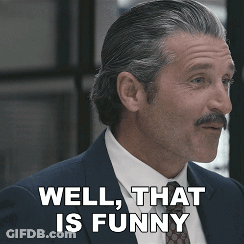 Man In Suit And Tie Saying Well That Is Funny GIF