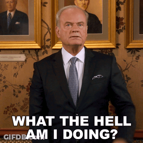 Man In Suit And Tie Saying What The Hell GIF