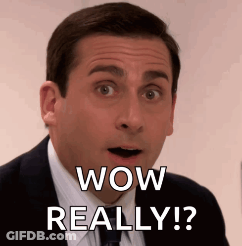 Man In Suit And Tie Saying Wow Really GIF