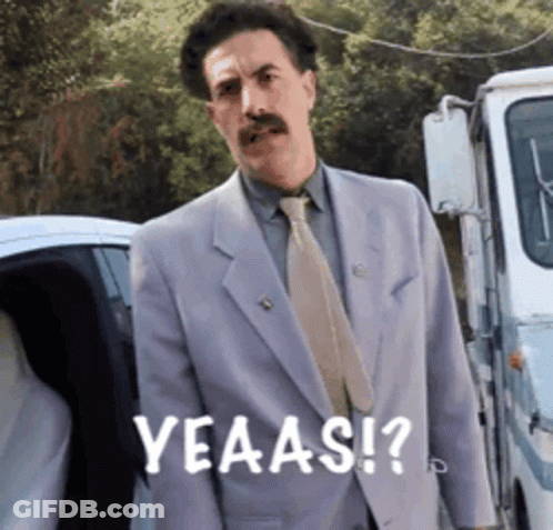 Man In Suit And Tie Saying Yeaas GIF