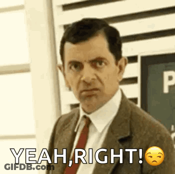 Man In Suit And Tie Saying Yeah Right GIF