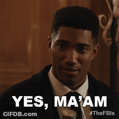 Man In Suit And Tie Saying Yes Ma'am GIF