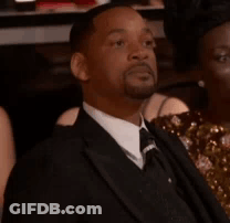 Man In Suit And Tie Saying Yes GIF