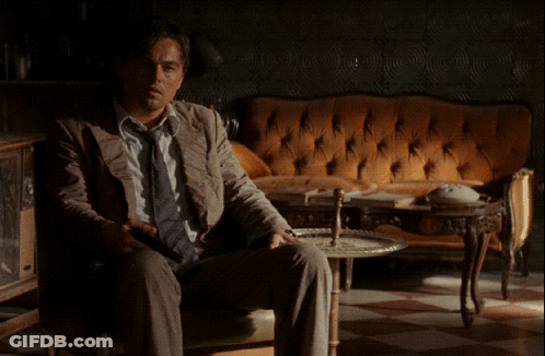 Man In Suit And Tie Saying Yet Here We Are GIF