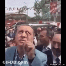 Man In Suit And Tie Saying Yok Beeee GIF