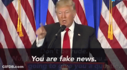 Man In Suit And Tie Saying You Are Fake News GIF