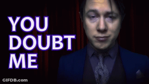 Man In Suit And Tie Saying You Doubt Me GIF