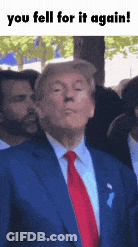 Man In Suit And Tie Saying You Fell For It Again GIF