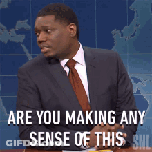 Man In Suit And Tie Says Are You Making Any Sense Of This SNL GIF