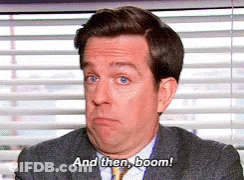 Man In Suit And Tie Says Boom GIF