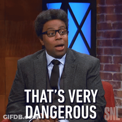 Man In Suit And Tie Says Dangerous SNL GIF