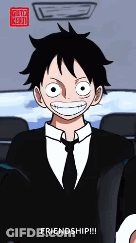 Man In Suit And Tie Says Friendship GIF
