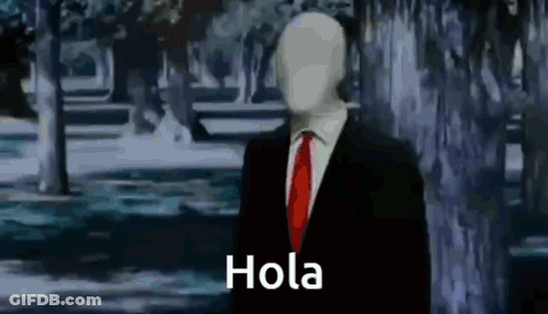 Man In Suit And Tie Says Hola GIF