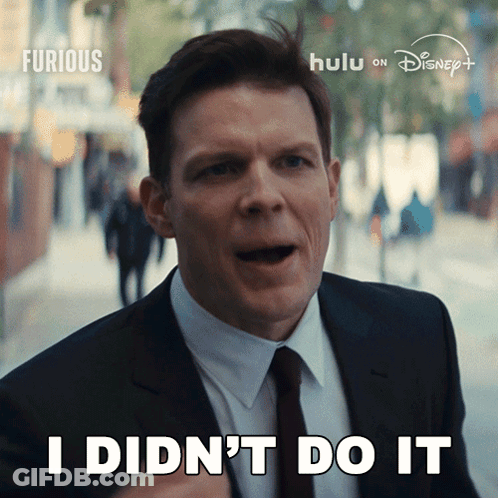 Man In Suit And Tie Says I Didn't Do It GIF