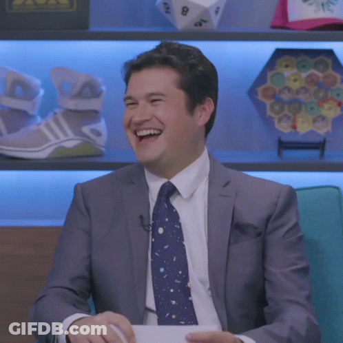 Man In Suit And Tie Says I'm Glad They Are Dead GIF