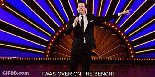 Man In Suit And Tie Says I Was Over On Bench GIF