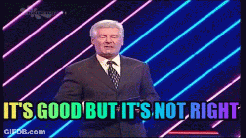 Man In Suit And Tie Says It's Good But It's Not Right On Stage GIF