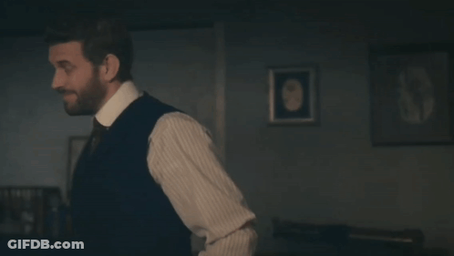 Man In Suit And Tie Says Little Bit Far Fetched GIF