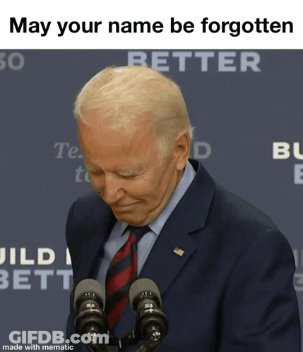 Man In Suit And Tie Says May Your Name Be Forgotten GIF
