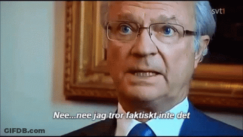 Man In Suit And Tie Says Nee GIF
