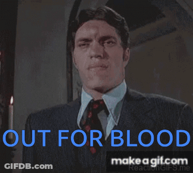 Man In Suit And Tie Says Out For Blood GIF