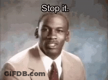 Man In Suit And Tie Says Stop It GIF