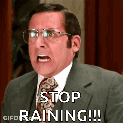 Man In Suit And Tie Says Stop Raining GIF