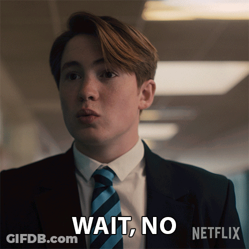 Man In Suit And Tie Says Wait No GIF