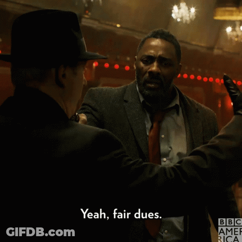 Man In Suit And Tie Says Yeah Fair Dues GIF