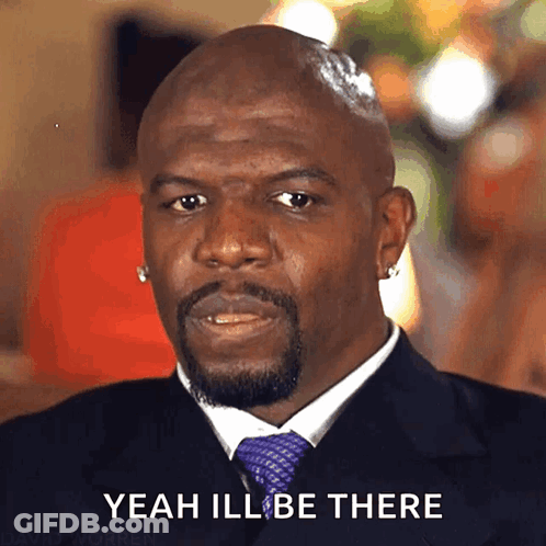 Man In Suit And Tie Says Yeah Ill Be There GIF