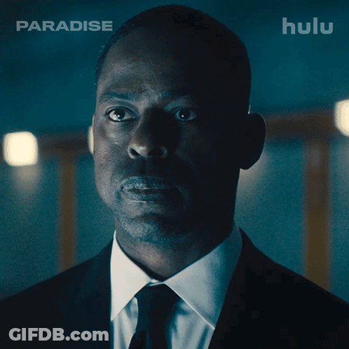 Man In Suit And Tie Says Yes On Hulu GIF